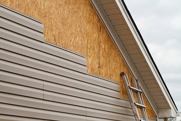 Professional Siding Installation technician working in Highspire, PA
